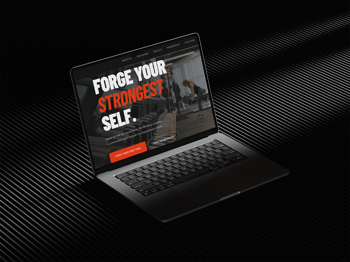 Example gym website design shown on a laptop